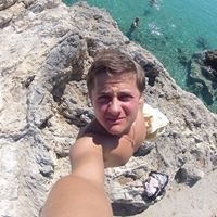 Андрей Служенко