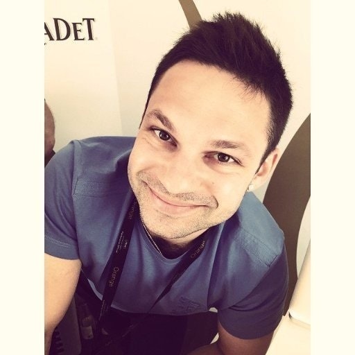 Original?auto=format&fit=crop&crop=faces&w=40&h=40