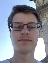 Максим Николаев