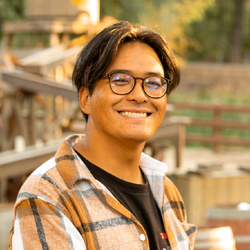C. Andrew Trin